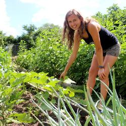 Allie Mason, the university's farm manager, discovered the community garden as an intern with Sustainable Carolina and says she found her home. Now, she can't get enough of the dirt and sunshine her post-college job has to offer. 