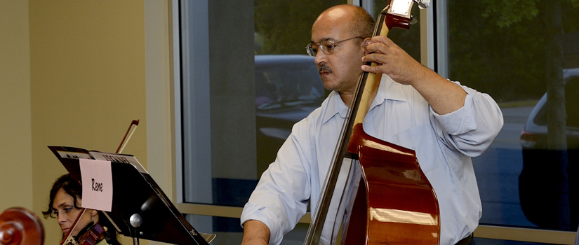 Adult cello student at Community Music School.