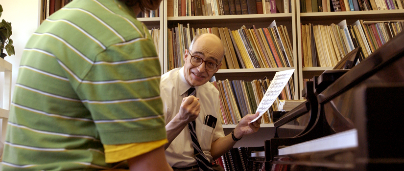 Dr. Fugo teaching student.