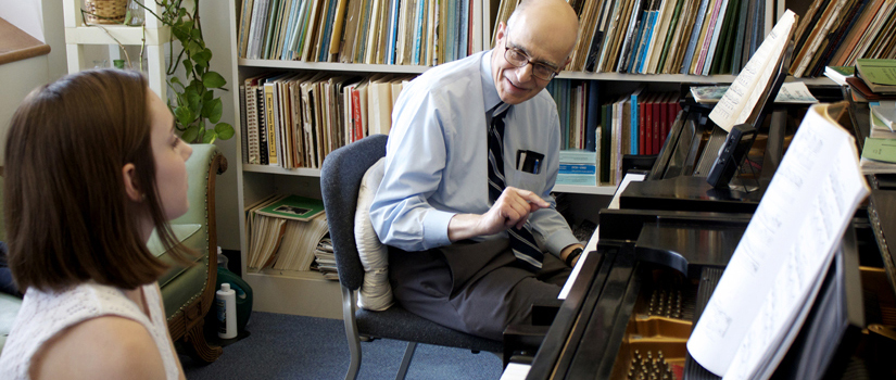 Dr. Charles Fugo and piano student
