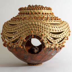 "Four Corners of Justice", 2015, Georgette Wright Sanders. Clay, sweetgrass, and wooden beads. 