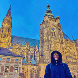 Student posing in front of building in Germany