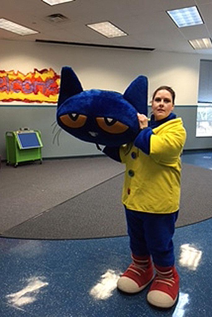 Mandy Malone dressing as Pete the Cat.