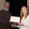 Natalie Swift receives the Outstanding Mass Communications Senior Award from Dr. Ken Campbell, sequence head.
