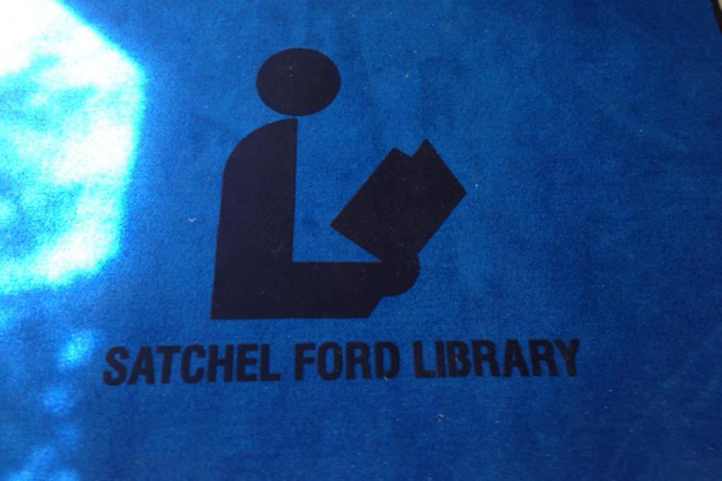 Photos from the Satchel Ford Elementary School Library before and after the flood.
