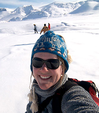 Lori Ziolkowski selfie with icy Antarctica backdrop.