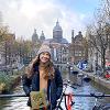 Charlotte Pollack on a bridge in Amsterdam