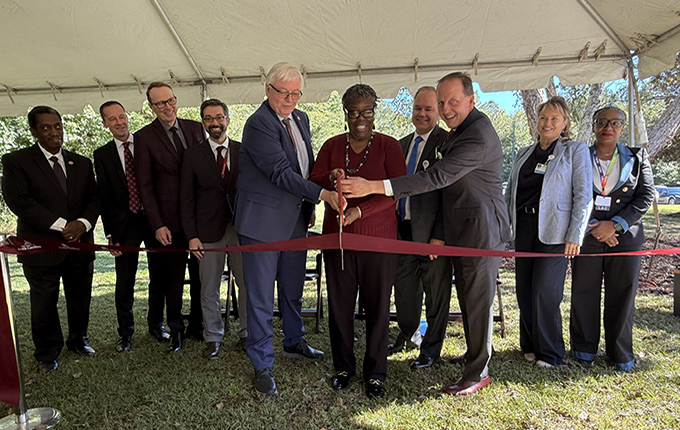 Image of people at a ribbon cutting ceremony