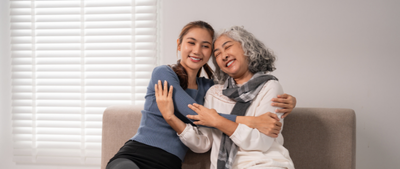 mother and daughter hugging 
