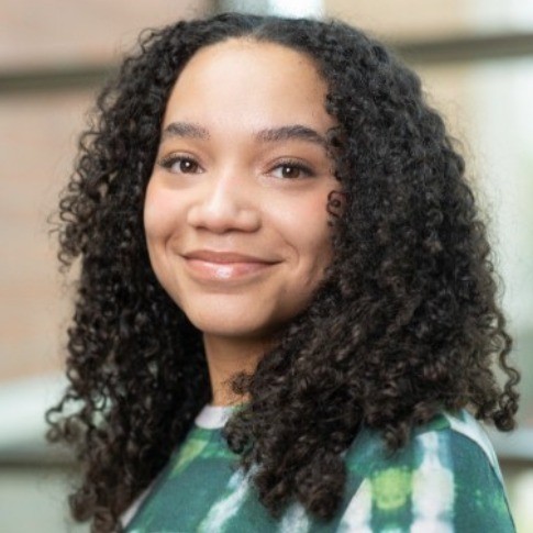 Ariel Prince is looking at the camera and smiling