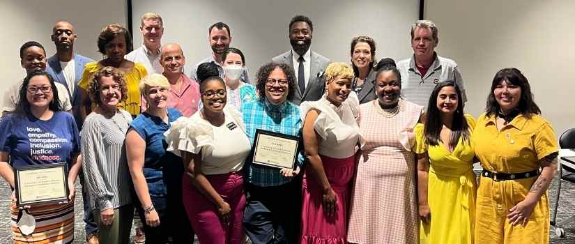 Inclusive Excellence Institute 2022 graduation group with diplomas