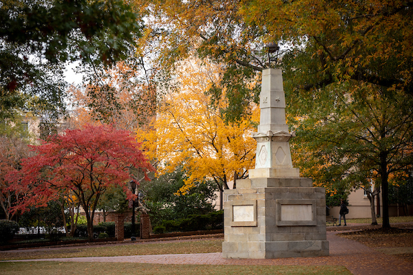 Maxcy monument surrounded by fall trees