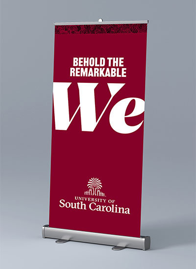 Pop up banner with The Remarkable We text and the University of South Carolina logo on a garnet background.