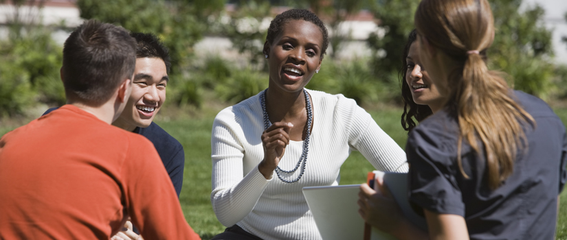 Black Professor on Lawn with Students