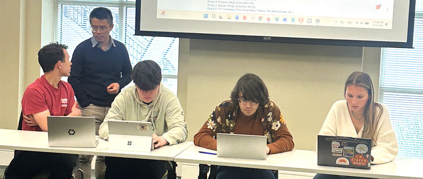 Matthew Lai in the classroom with students