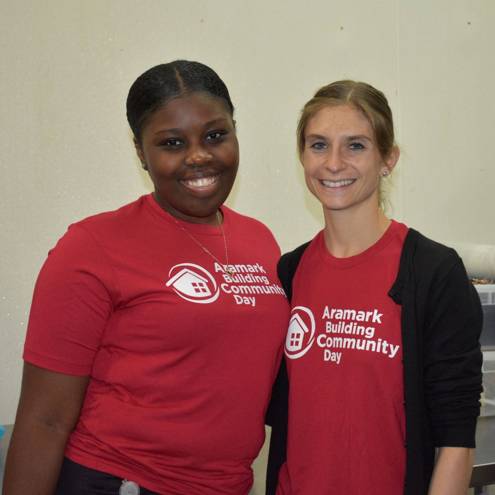 staff smiling during aramark building community day