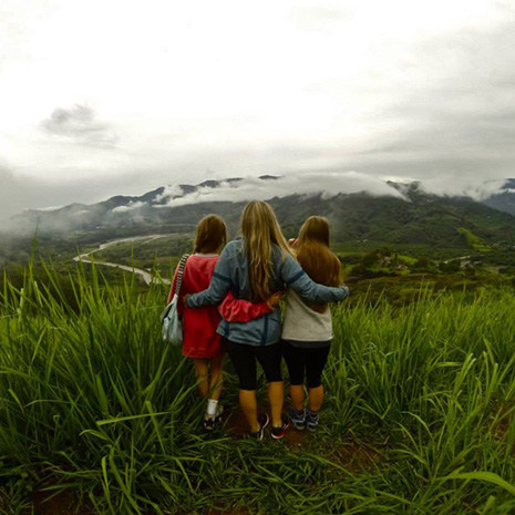 three girls looking at scenery in Costa Rica