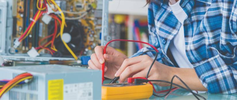 Person working on electrical device.