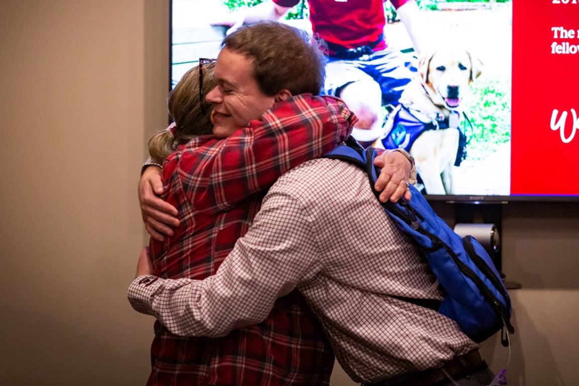 Jory Flemming hugging Dr. Tammi Richardson