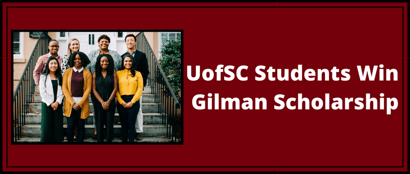The group of Gilman Scholars standing in front of DeSaussure College. 