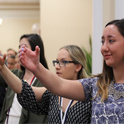 Students singing the alma mater