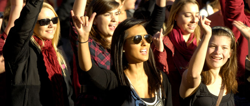 Students watching a USC football game