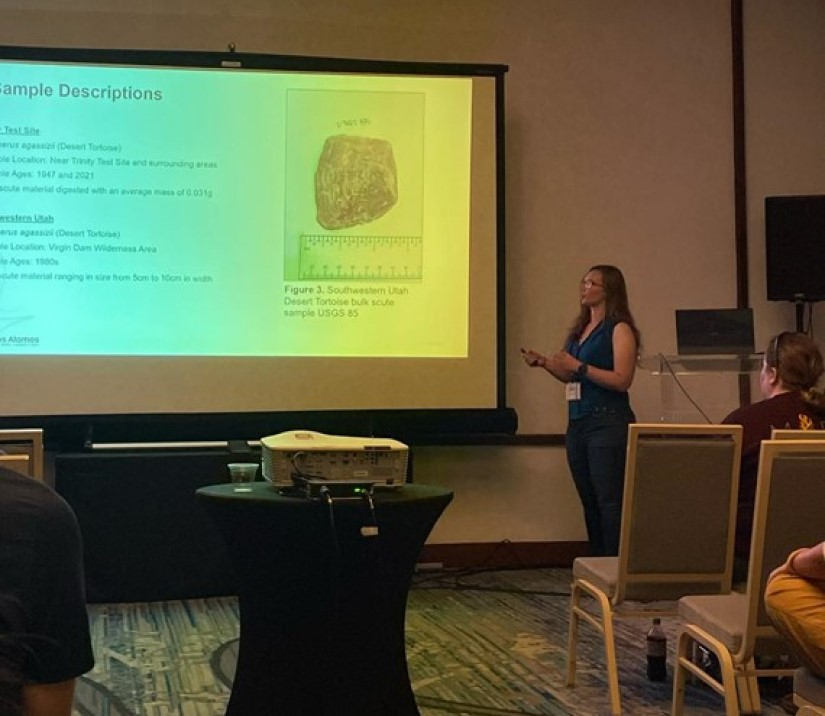 Allison Brown, a geological sciences Ph.D. candidate, presents her paper, "Presenting Evidence for Bioaccumulation of Plutonium and Neptunium Radionuclides in Turtles, Tortoises, and Sea Turtles from Nuclear Test Sites," at the MARC Conference in 2025. 
