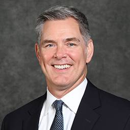 headshot of Tom Reichert