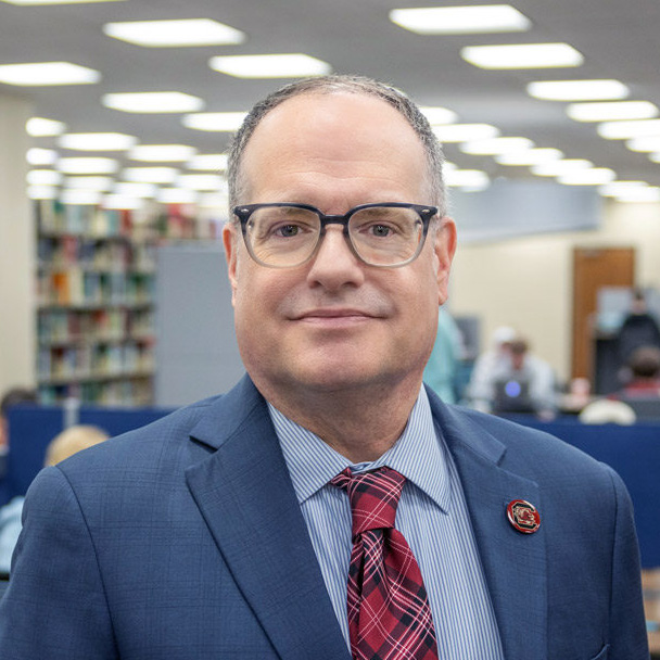 Professional headshot of Dean Banush