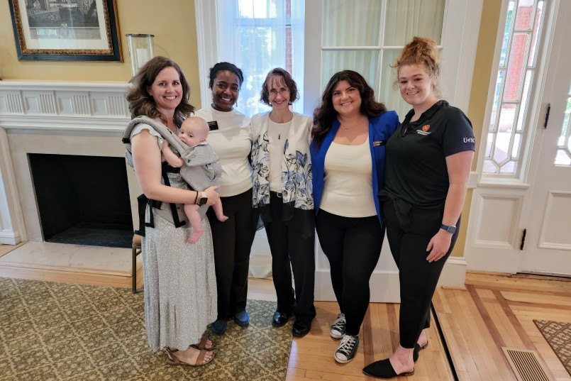 The Office of Undergraduate Research staff poses with Julie at her retirement reception. Pictured from left to right are Tricia Kramer, Briahnna Ismail, Julie Morris, Whitney Cagle and Abby Chapin.