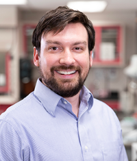 Portrait photo of Austin Worden, Director of the IRF