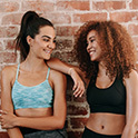 Two women relaxing after a workout