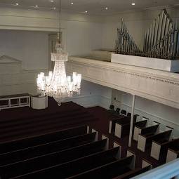 view of the chapel from above, pipe organ and chandelier
