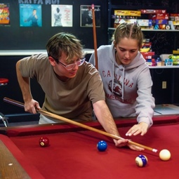 Students playing pool.