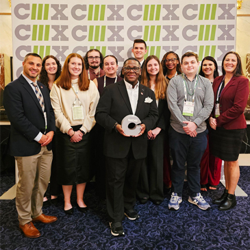 A dozen USC representatives pose for a photo at the NACAS C3X Conference in Las Vegas, Nevada