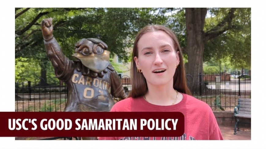 "USC's good samaritan policy" student standing in front of cocky statue