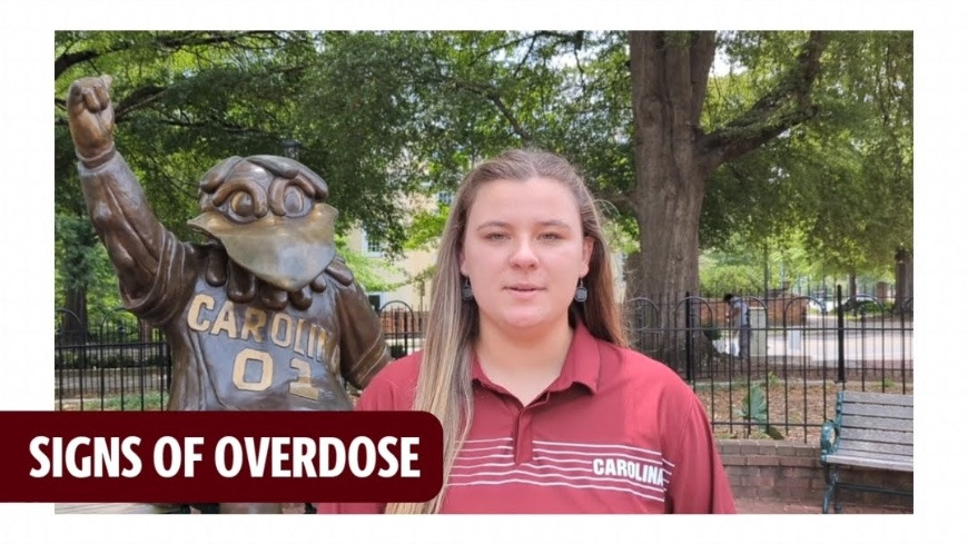 "Signs of overdose" student standing in front of cocky statue