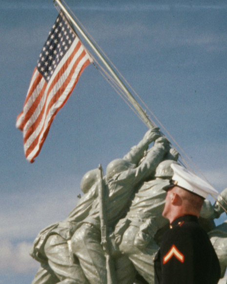 Statue of Raising the Flag of Iwo Jima at Marine Corps Recruit Depot,Parris Island, South Carolina, with a soldier looking at it