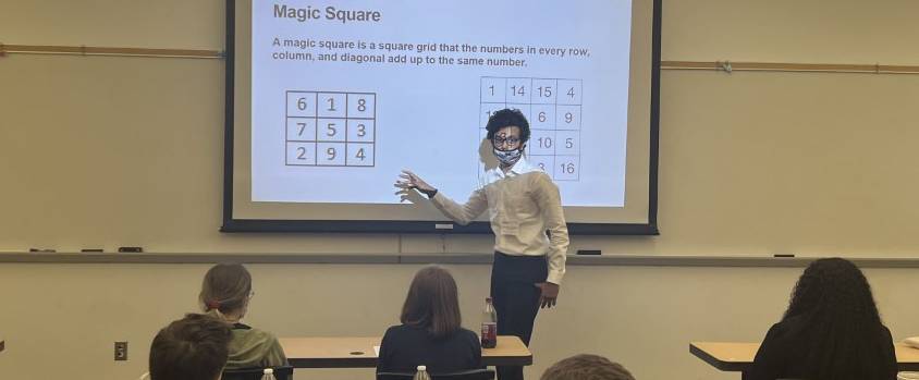 Student presenting at conference.