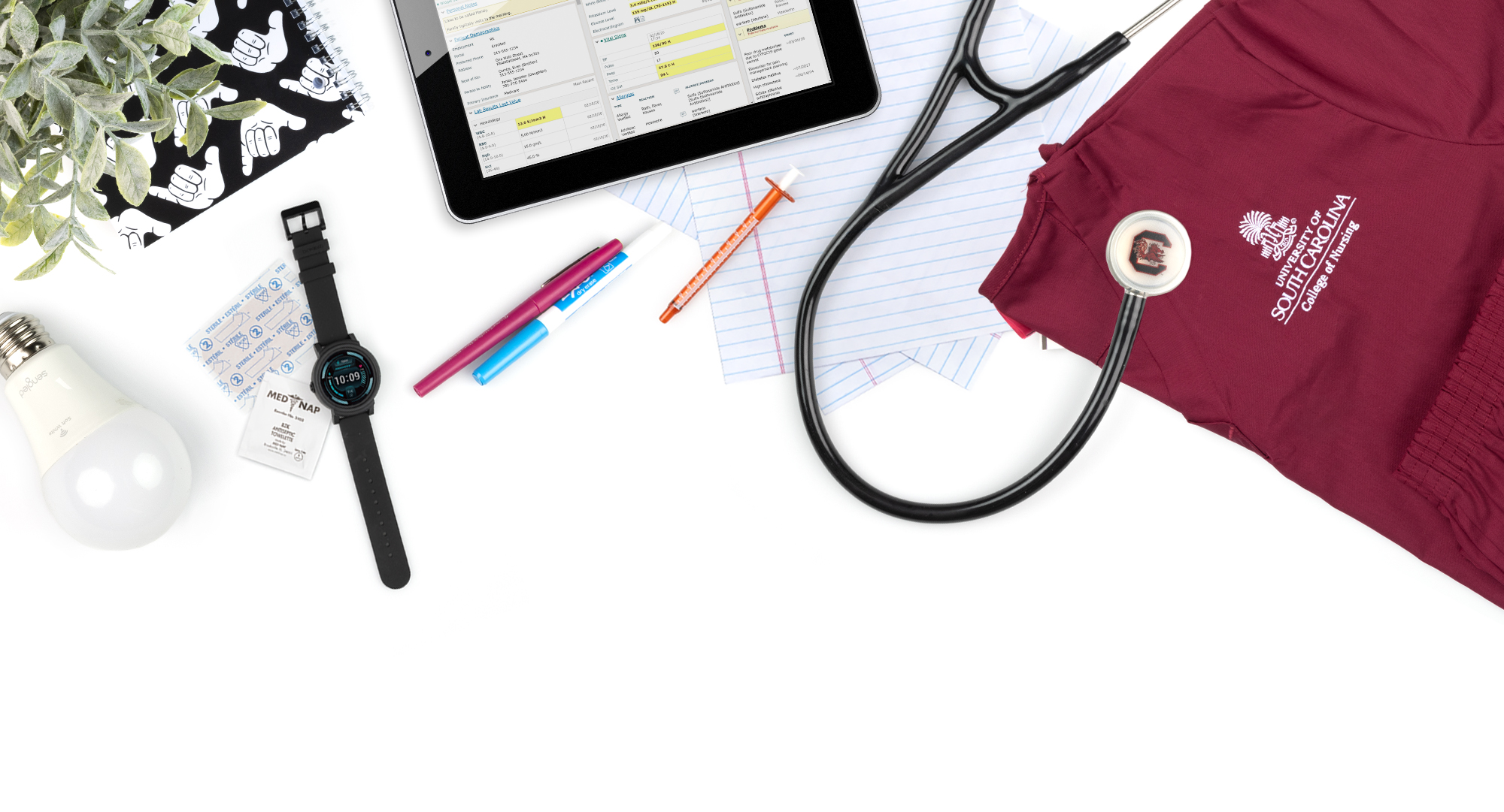 Various items representing the College of Nursing on a white background.