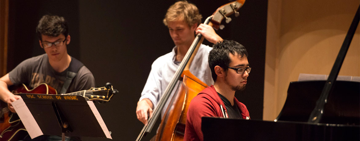 jazz trio performing on stage at the School of Music Recital Hall