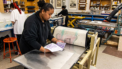 Students in a printmaking classroom.