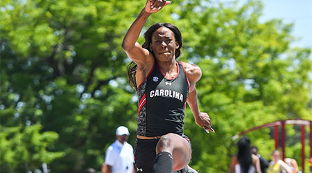 Student jumping hurtles in a race. 