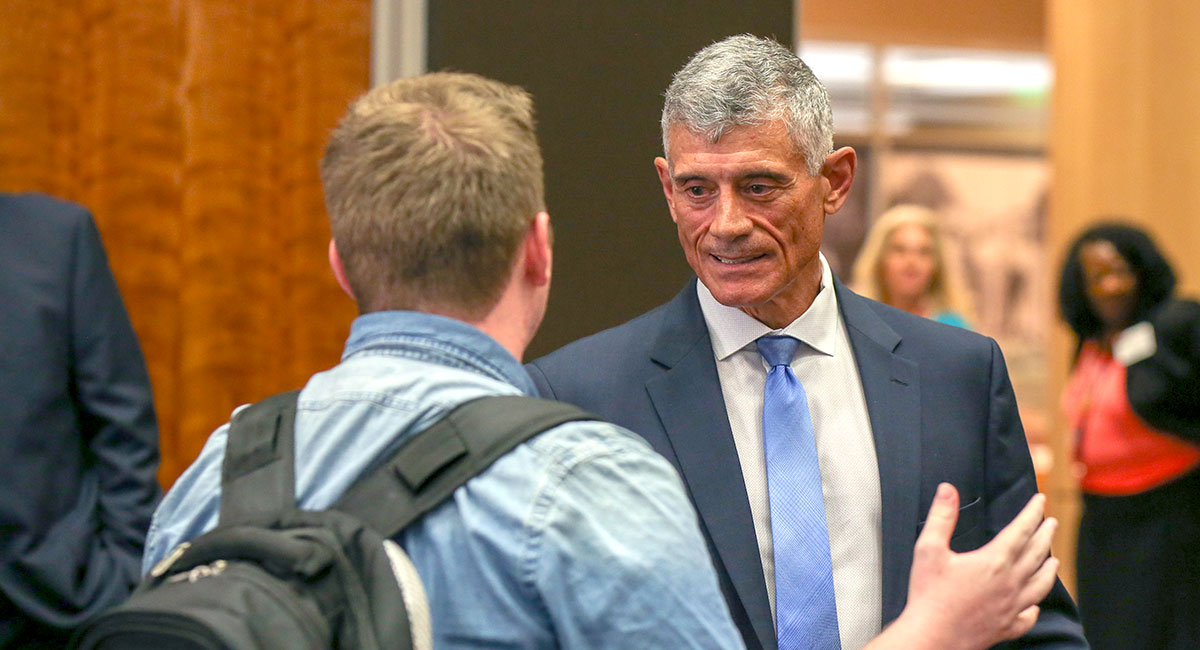 Caslen talking with students and faculty