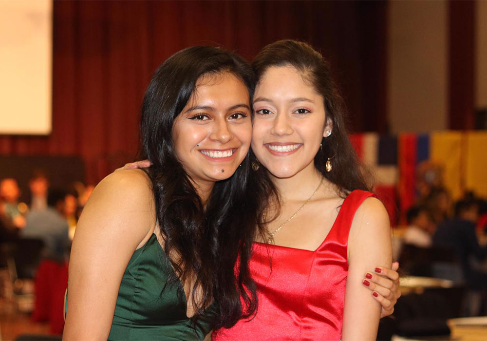 Two students dressed up at a Latin American Student Organization event.