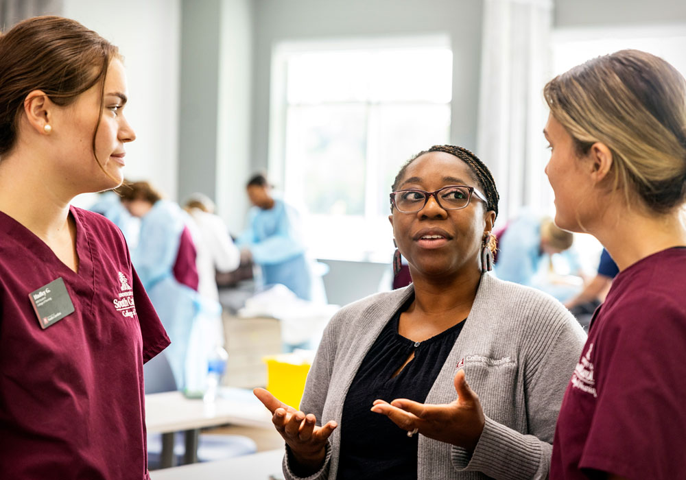 Nurses and students in a clinical setting