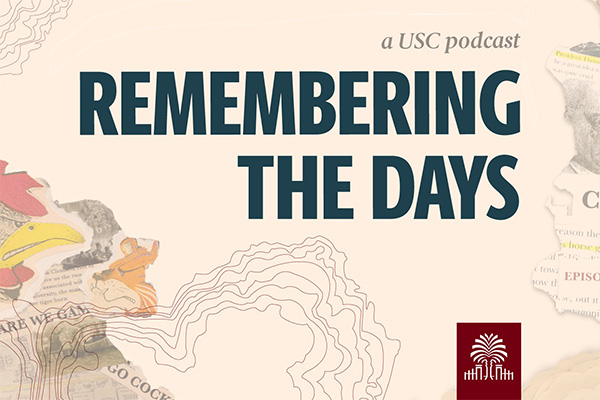 Students pose with balloons at a meet and greet event.