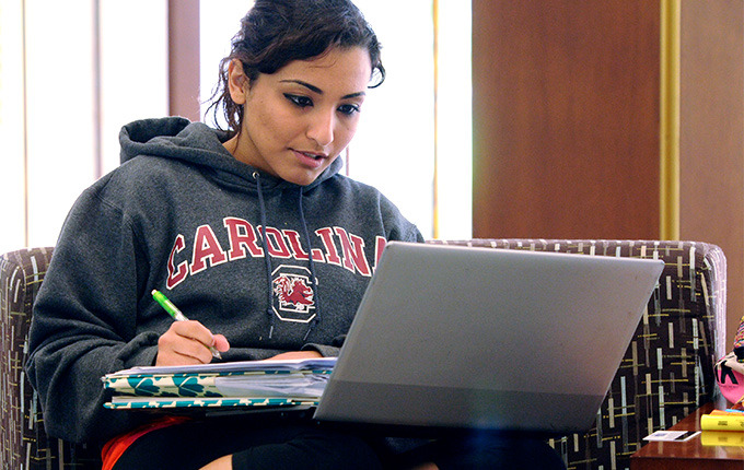 female student using a laptop