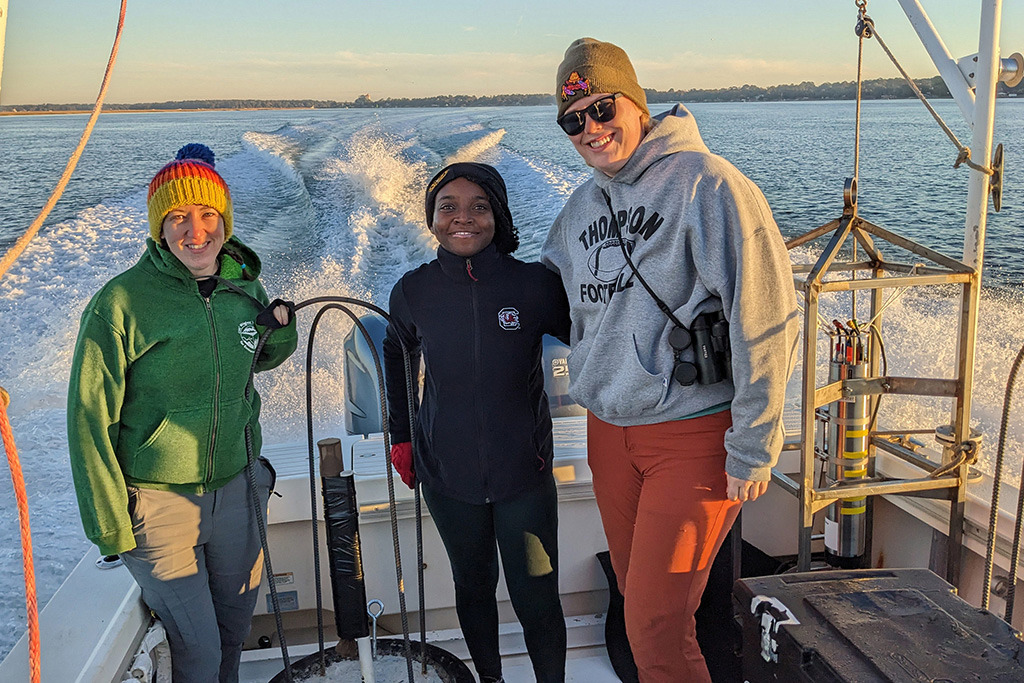 Erin Meyer-Gutbrod (left) with Marine Science Ph.D. students Amadi Afua Sefah-Twerefour (center) and Abby Kreuser (right)