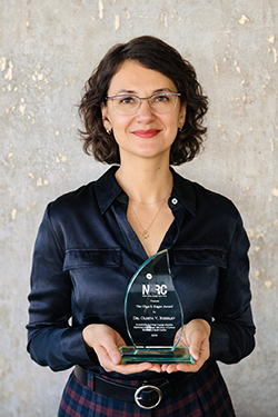 Prof. Kisselev holding an award